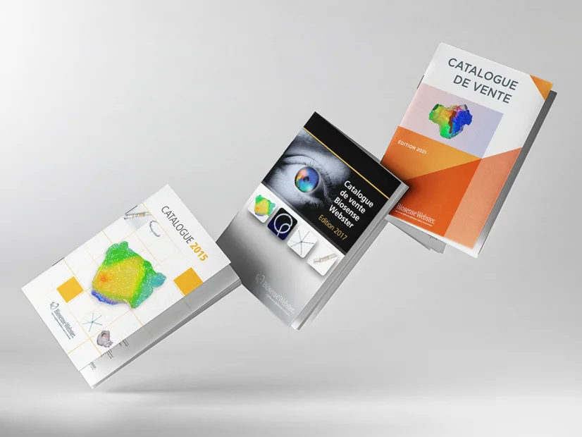 Three Biosense Webster sales catalog covers, the 2015, 2017 and 2021 editions, floating in a row against a light grey studio ground